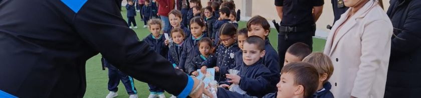 Young children in line during morning assembly at school.
